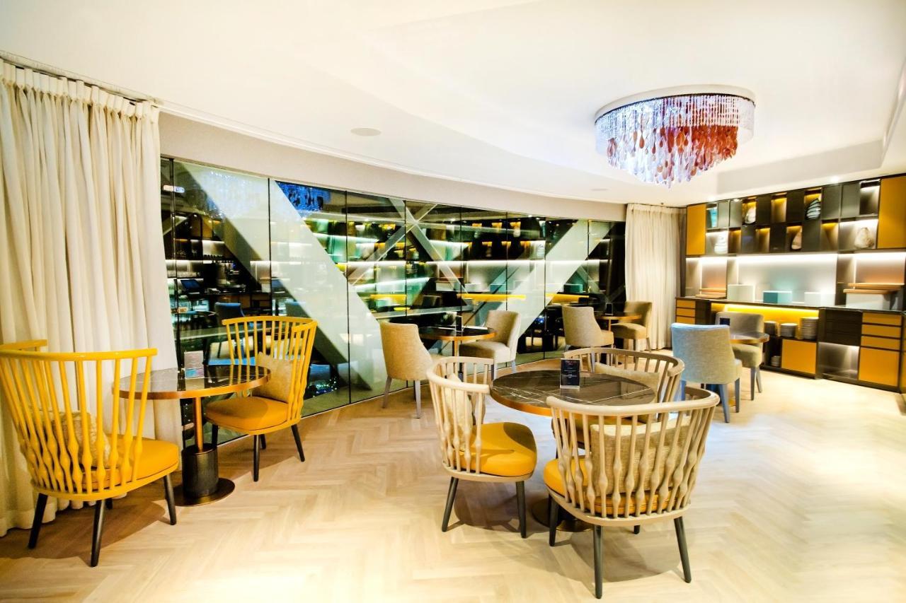 Andaz Capital Gate Abu Dhabi, By Hyatt Hotel Exterior photo The interior of the restaurant